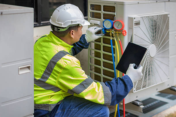 Professional Ductwork Repair technician working in Woodhaven, MI